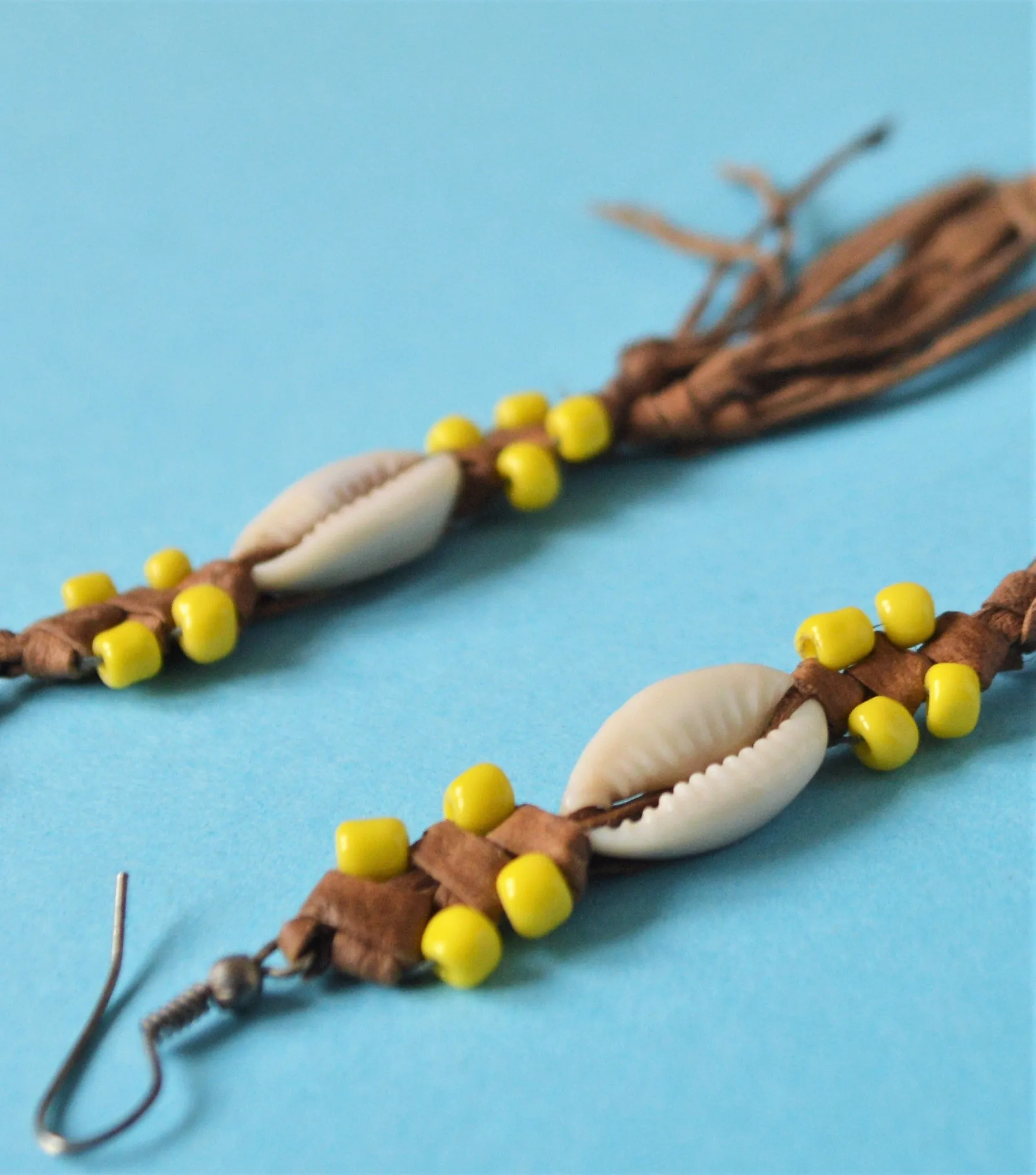 Tassel leather earrings yellow beads